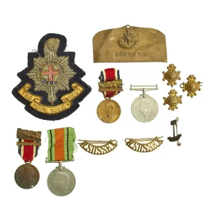 Original British WWII Royal Sussex Regiment Insignia and Medal Collection