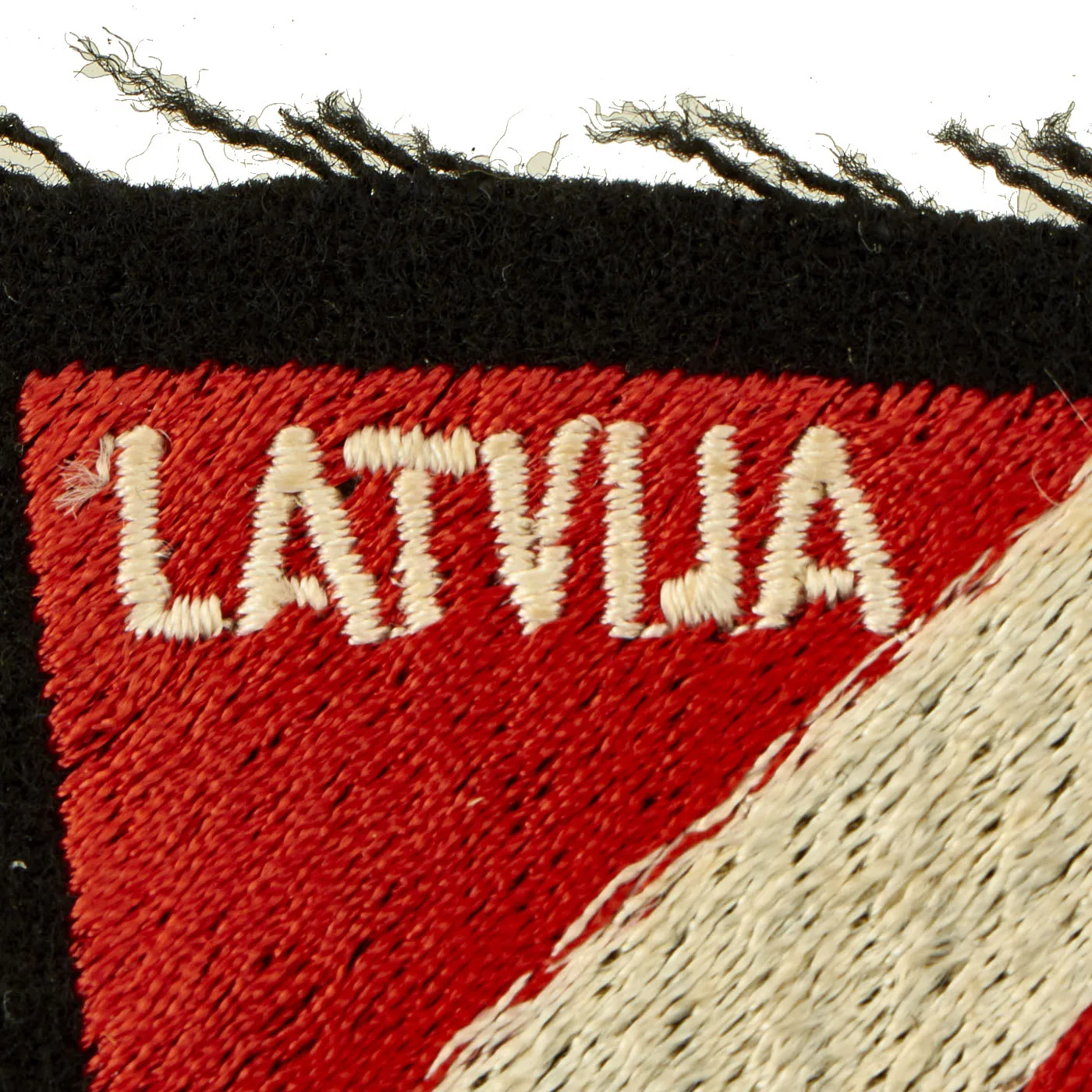 Original German WWII Embroidered Waffen SS Latvian Volunteer Shield Sleeve Insignia
